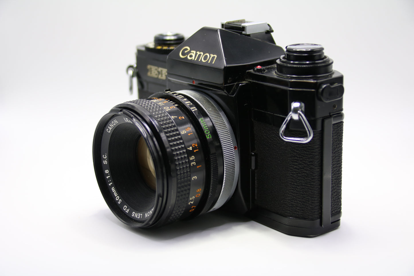 Canon EF + 50mm FD 1.8