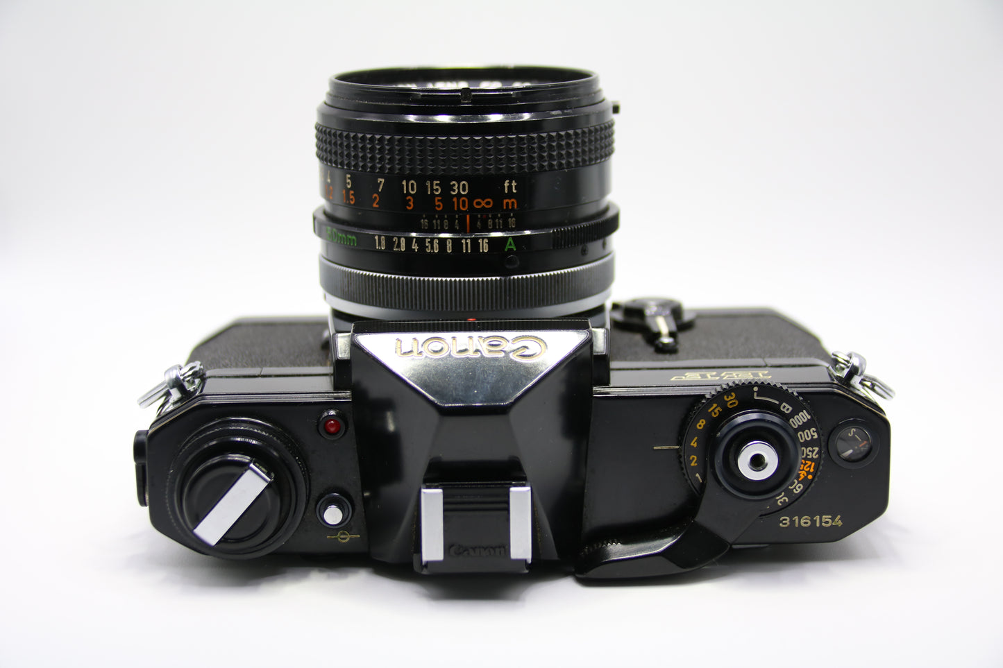 Canon EF + 50mm FD 1.8