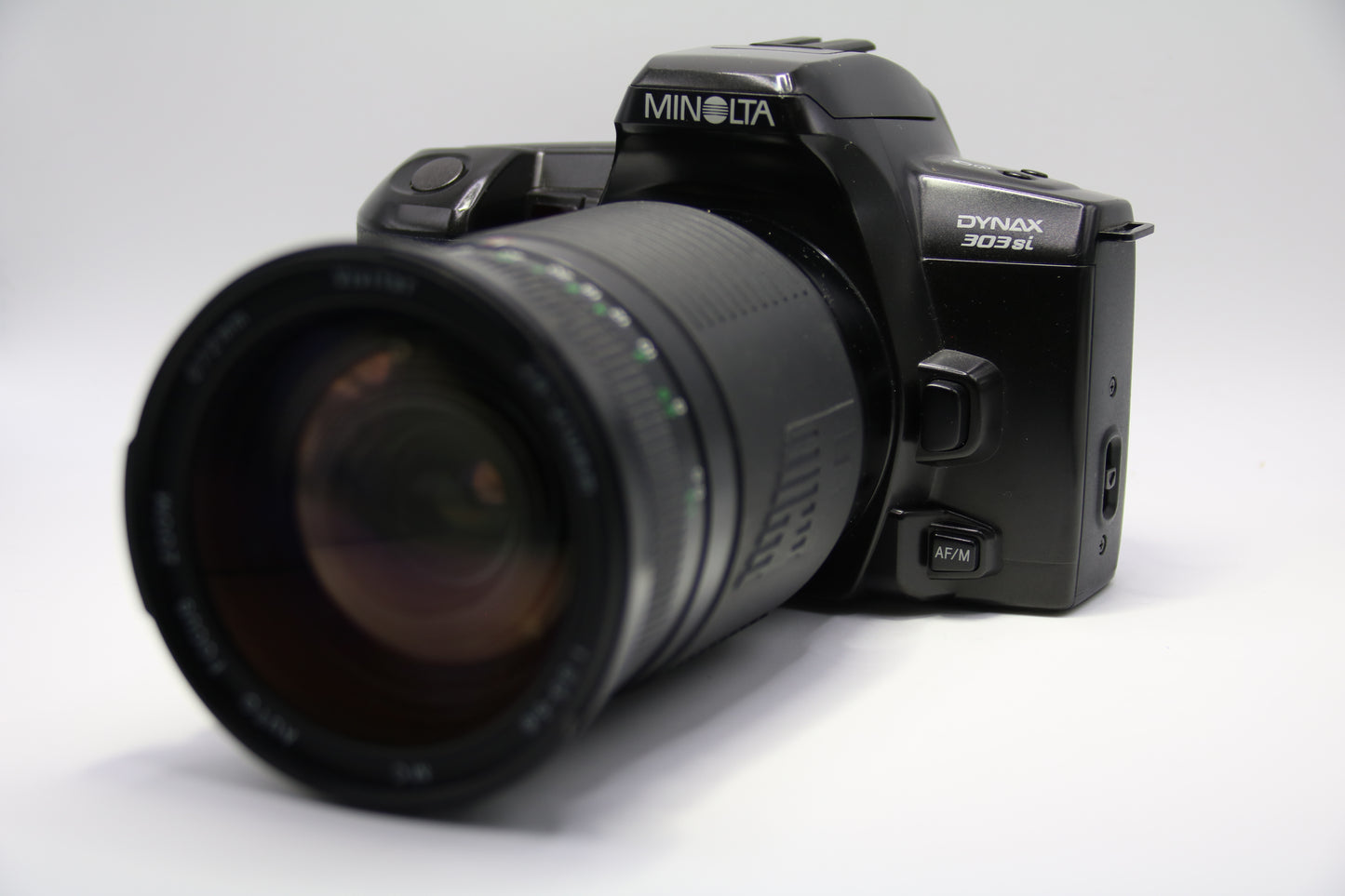 Minolta 303SI + Vivitar 28-210mm