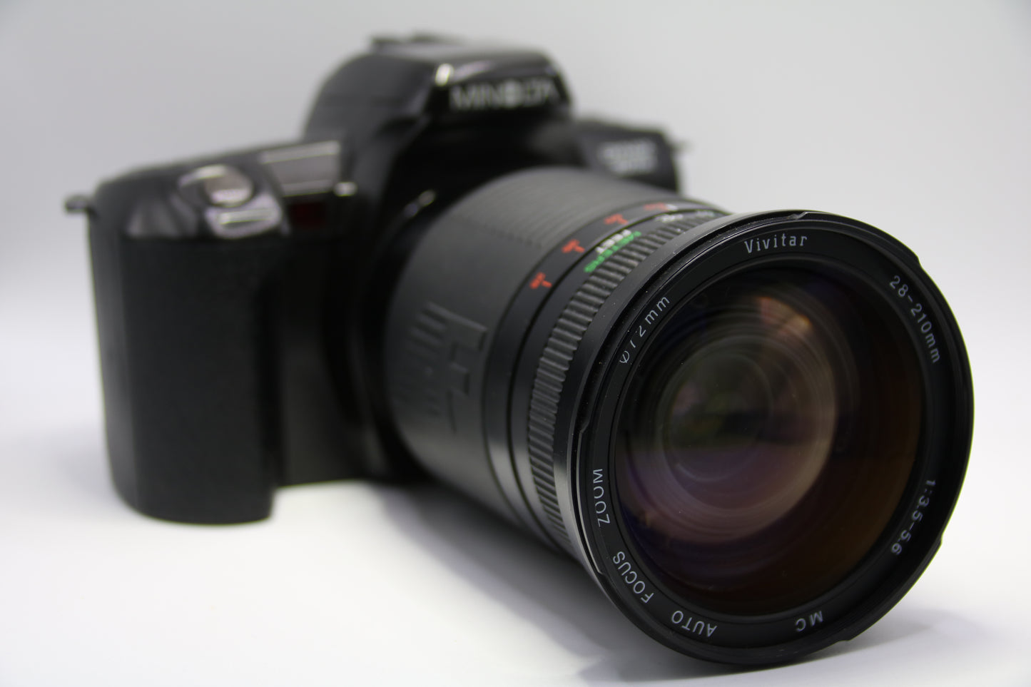 Minolta 303SI + Vivitar 28-210mm