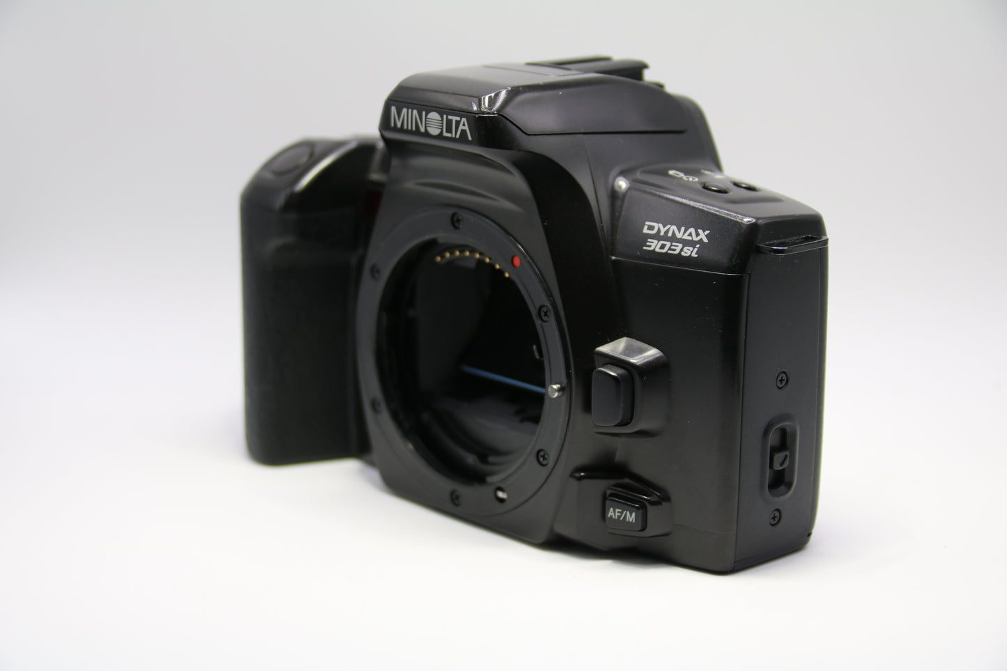 Minolta 303SI + Vivitar 28-210mm