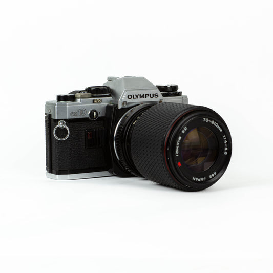 Olympus OM-10 + Tokina 70-210mm