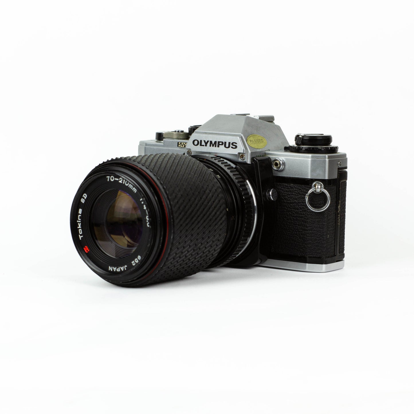 Olympus OM-10 + Tokina 70-210mm