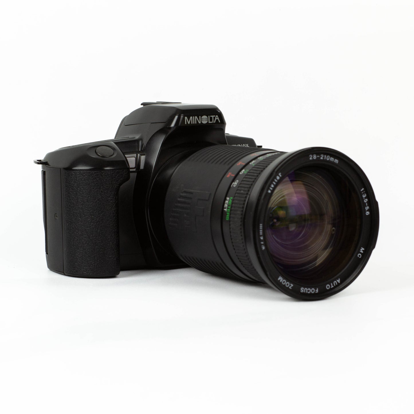 Minolta 303SI + Vivitar 28-210mm